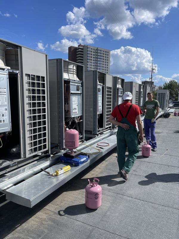 On the roof: LG outdoor units and refrigerant charging